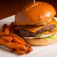 Pub Burger · Signature item. ½ lb. charbroiled beef, hickory-smoked bacon, beer-battered onion ring, Ched...