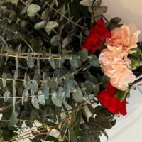 Deluxe Eucalyptus Bunch · Two types of fresh  Eucalyptus and Carnations prepared to hang in your shower.