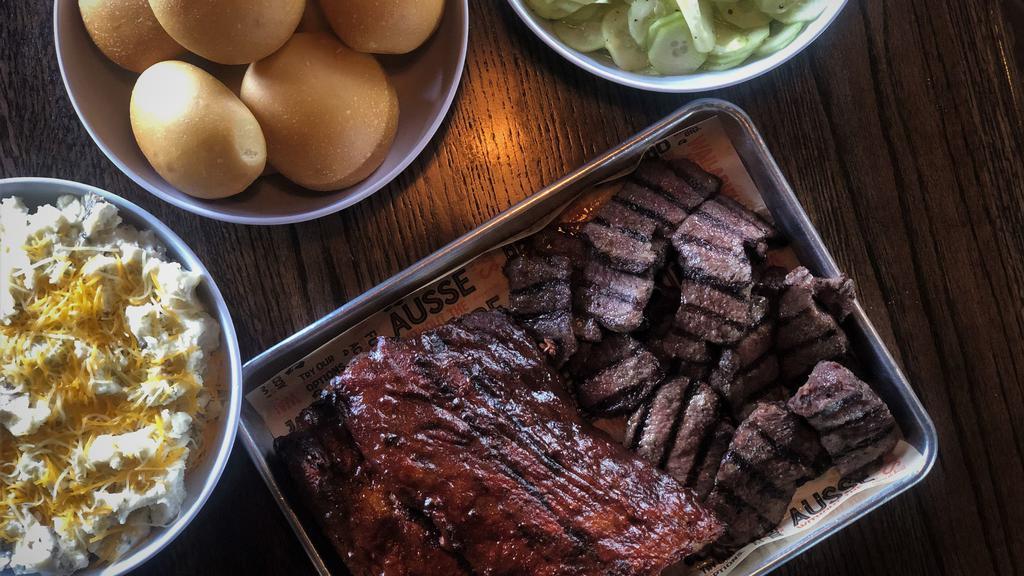Family Feast · It feeds about four adults. Our family feast is a great option for feeding a group. Get food for everyone to share. It comes with: two smokehouse meats, two side quarts, six rolls, BBQ sauce.