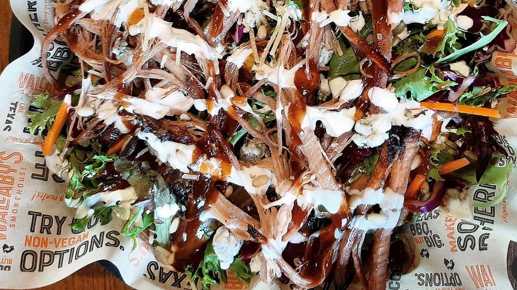 Bob’S Beef Brisket Salad · Smoked beef brisket, Parmesan, gorgonzola and roasted pine nuts on mixed greens topped with homemade ranch and BBQ sauce.