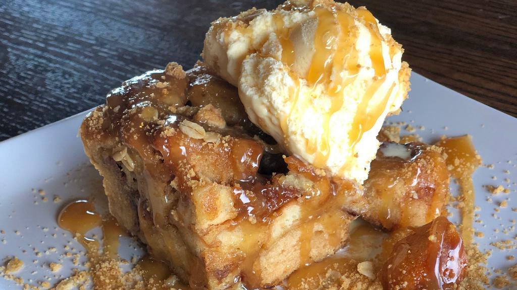 Caramel Crisp Bread Pudding · Moist bread cake topped with graham cracker crumbs and drizzled with caramel.