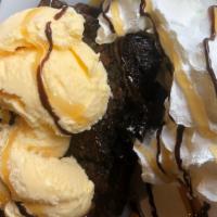 Oreo Brownie · Chocolate brownie with vanilla ice cream whipped cream and chocolate and caramel drizzle top...