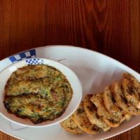 Dungeness Crab Dip · Havarti, roasted garlic, fresh spinach, Walla Walla sweet onions