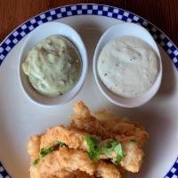 Super Calamari Steak Strips · Tender, large squid steaks cut in house and made-to-order with homemade tequila lime aïoli a...