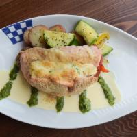 Off The Hook Stuffed Salmon · Stuffed with dungeness crab, wild Mexican Pacific prawns, Havarti, Parmesan and Asiago chees...