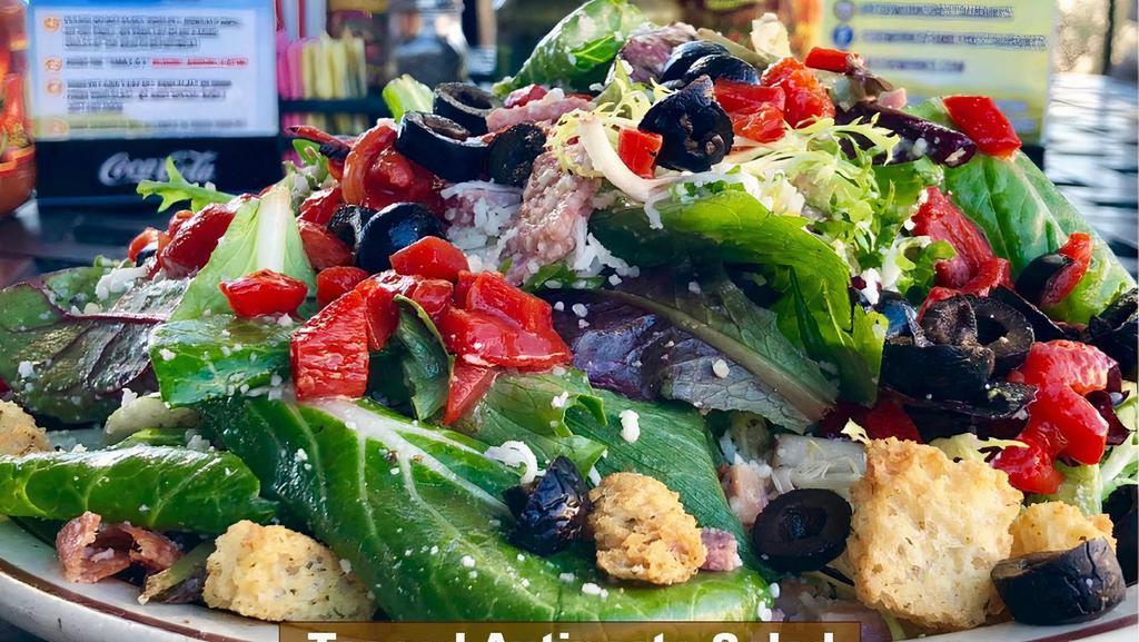 Tossed Antipasto Salad · Spring lettuce mix with Salami,Pepperoni,Ham,Mozzarella,
and Parmesan cheese tossed with creamy Italian dressing then topped with diced roasted red bell peppers, black olives and croutons.