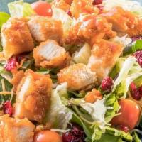 Sticky Finger Salad · Chopped Sticky Fingers, lettuce, shredded cheddar jack cheese, tomatoes, and craisins, with ...