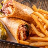 Sticky Finger Wrap · Our Famous Sticky Fingers, shredded cheddar jack cheese, lettuce, tomato, and our Creamy Ama...