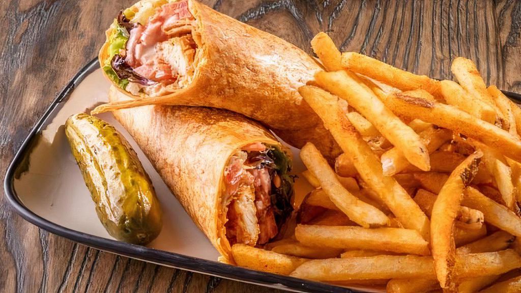 Sticky Finger Wrap · Our Famous Sticky Fingers, shredded cheddar jack cheese, lettuce, tomato, and our Creamy Amazing sauce packed in a chipotle tortilla.
CAL. 910 - 1250