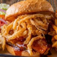 Cowboy Burger · 100% fresh ground chuck loaded with Double Barrel BBQ sauce with cheddar cheese, applewood s...
