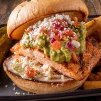 Baja Grilled Salmon Pounder · Grilled Atlantic Salmon, miso-ginger coleslaw, pico de gallo, fresh house made guacamole and...