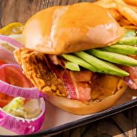 Avocado Bacon Chicken Pounder · Grilled or hand-breaded chicken breast with fresh avocado, Applewood smoked bacon, sharp che...