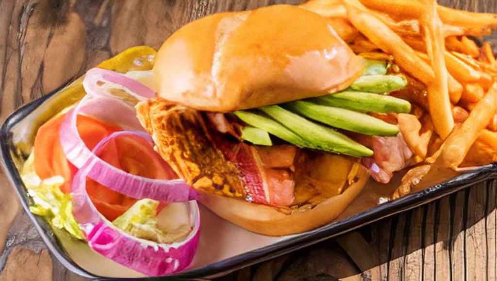 Avocado Bacon Chicken Pounder · Grilled or hand-breaded chicken breast with fresh avocado, Applewood smoked bacon, sharp cheddar cheese on a mayo'd bun.