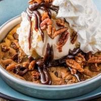Cookie Zookie · Hot out of the oven, fresh baked chocolate chip cookie, topped with vanilla ice cream, hot f...