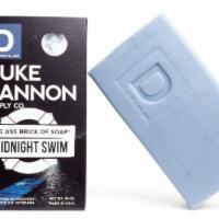 Midnight Swim  · Duke Cannon’s idea of aquatic refreshment is a moonlit cannonball into the crystal blue wate...