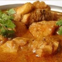 Chicken Curry · Dried spices simmered in an onion, ginger, and garlic sauce. Gluten-free.