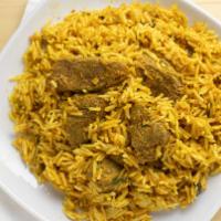 The Delhi Lamb Biryani · Basmati rice cooked with lamb in mild spices, raisins, and cashews.