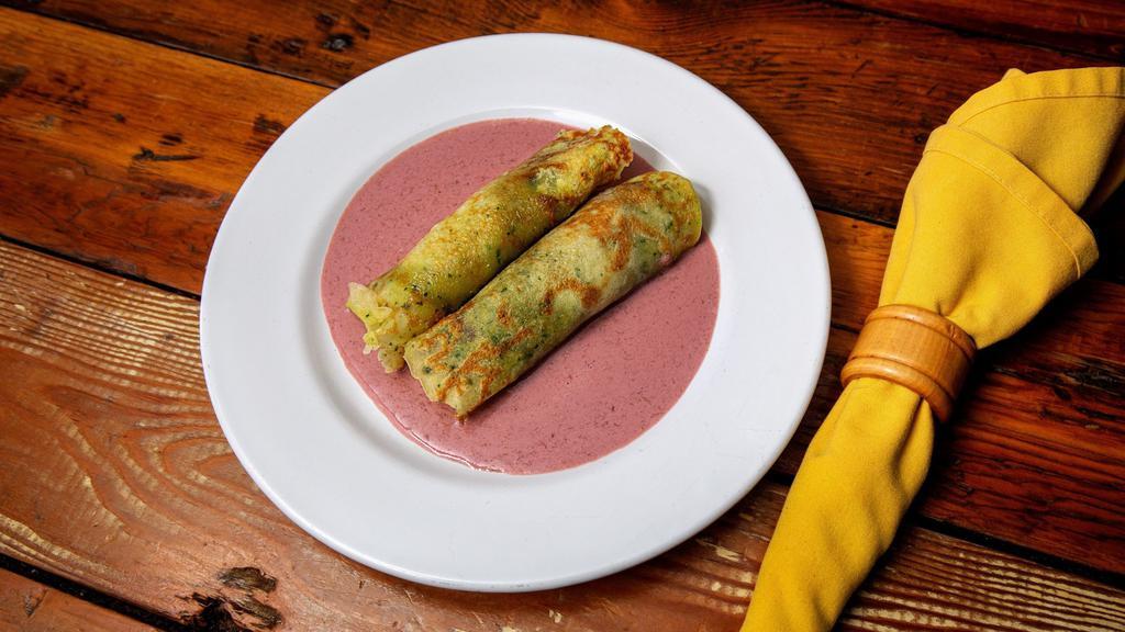 Gluten Free Herbed Crepes · Filled with mushrooms spinach ricotta and served with plum creme fraiche.

Consuming undercooked meats or eggs may increase your risk of food borne illness.