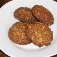 4 Pc Large Oatmeal Cookies · House Baked Oatmeal Cookies, chocolate chips, hint of molasses