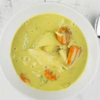 Yellow Curry · Yellow curry in coconut milk with chunks of simmered chicken breast potatoes carrots and oni...