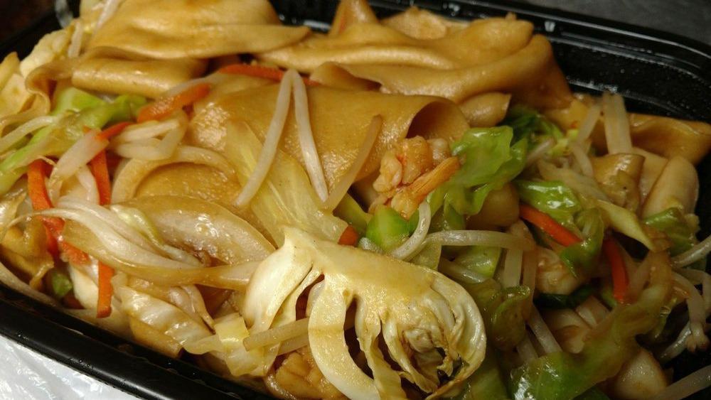 House Special Stir Fried Noodle · Beef chicken and shrimp stir fried noodle.