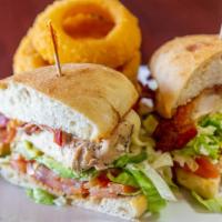 California Sand-Wedge* · Grilled chicken breast, bacon, avocado, lettuce, tomato & melted swiss on a toasted telera.