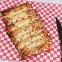 Cheesy Bread Sticks · 8 freshly baked bread sticks smothered in Wisconsin whole milk mozzarella cheese and garlic ...