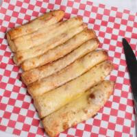 Enzo Bread · 8 freshly baked bread sticks covered in garlic and Parmesan cheese.