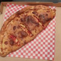 Colossal Calzone · Two toppings of your choice.