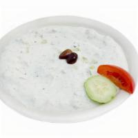 Tzatziki · yogurt, cucumber, fresh garlic, mint, za'atar, pita