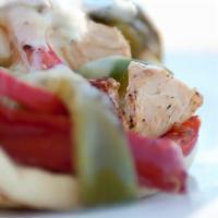 Philly Chicken Pita · grilled marinated all-natural chicken breast, roasted bell peppers and onions, swiss, greek ...