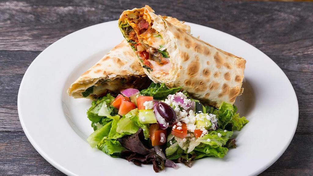 Wood-Fired Veggies Lavash Wrap · eggplant, zucchini, bell peppers, tomatoes, onions, with feta, mozzarella, lavash wrap, wood-fired, side greek salad