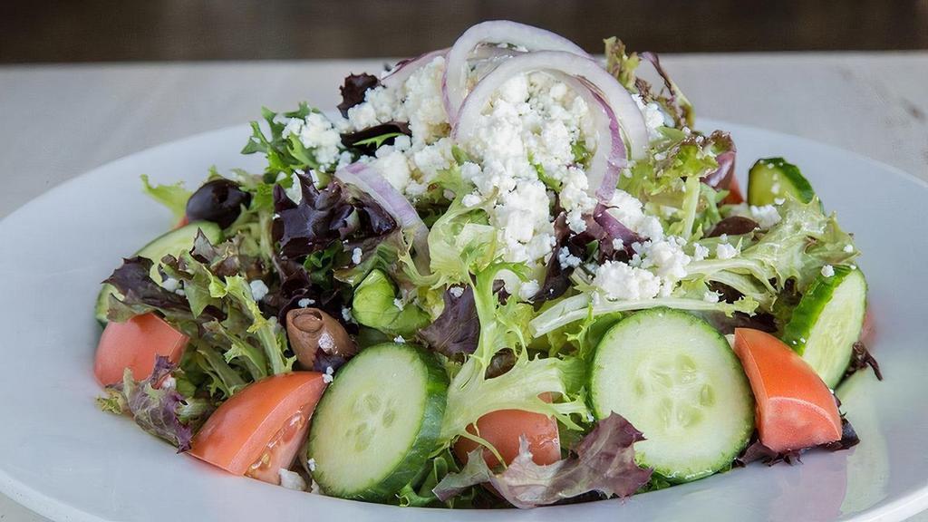 Greek Salad · seasonal mixed greens, tomatoes, cucumbers, red onions, feta, kalamata olives, lemon vinaigrette