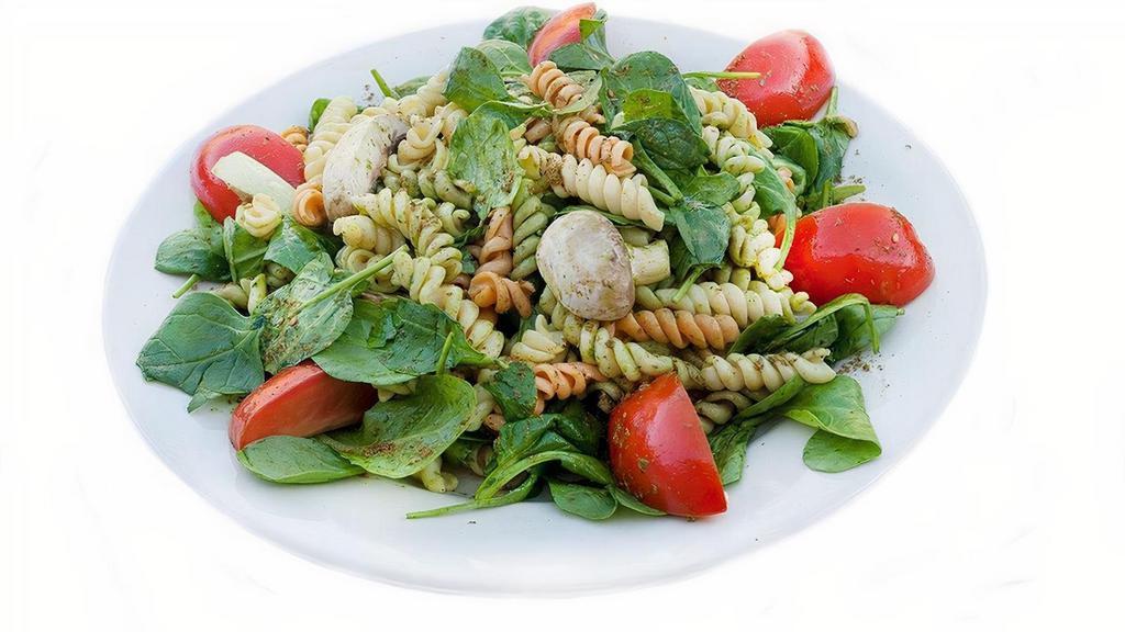 Spinach Pasta Salad · fresh spinach, tri-color rotini pasta, tomatoes, roasted mushrooms, bell peppers, pesto, za'atar, lemon vinaigrette