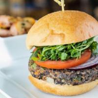 Chipotle Black Bean Burger · homemade black bean patty formed with chipotle, jalapenos and bell peppers, carrots, corn, o...
