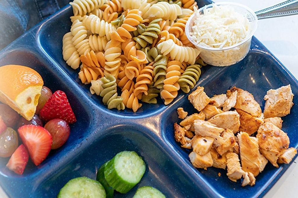 Kids Meal · 1 grains/carbs, 1 protein, 1 vegetable, seasonal fruit. Served with a kid's drink.