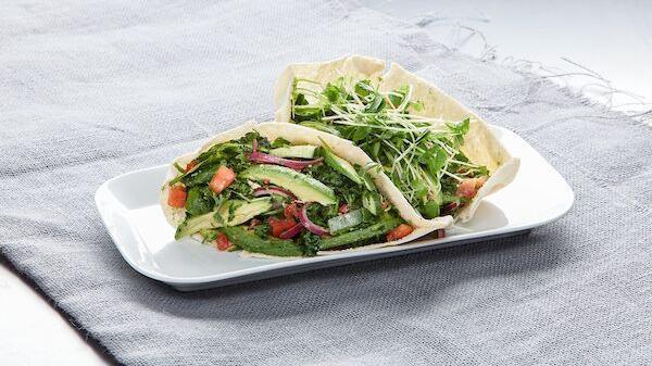 Veggie Pita Pocket · avocado, baby greens, seasonal mixed greens, tomatoes, cucumbers, bell peppers, red onions, sprouts, taboule, lemon vinaigrette, in a pita pocket, served with tahini