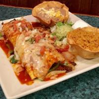 Fajita Burrito · Flour tortilla stuffed with rice, beans, grilled onions, and green peppers. Topped with onio...
