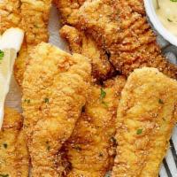 Catfish Nuggets With Fries Or Onion Rings · Southern fried cat fish nuggets seasoned to perfection.