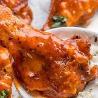 12 Spicy Buffalo Wing Meal · 12 Spicy Bufflalo Wings Tossed in Buffalo Sauce with Fries or Onion Rings.
