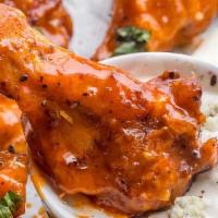 6 Spicy Buffalo Wing Meal · Spicy Wings Tossed in Buffalo Sauce With Fries or Onion Rings.
