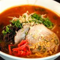 Spicy Miso Men · Chashu, bean sprouts, spinach, scallions & soft boiled half egg in spicy miso broth over ramen