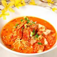 Kim Chi Ramen · Kimchi, Spicy chicken, bean sprouts, spinach, scallions & soft boiled half egg in spicy miso...
