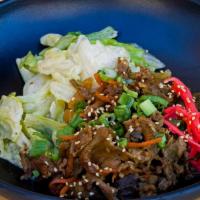 Bulgogi Bowl · Marinated sliced beef sautéed over steamed rice