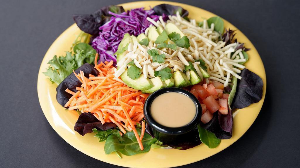 Avocrunch Salad™ · Organic Field Greens · Tomato · Carrots · Red Cabbage · Crispy Noodles (GF) · Sliced Avocado · Slivered Almonds · Cilantro · Sweet Ginger Miso Dressing