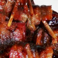 Bacon-Wrapped Dates · Serves 2. Delicious Sweet Medjool Dates wrapped in thick-cut Applewood Smoked Bacon, with yo...