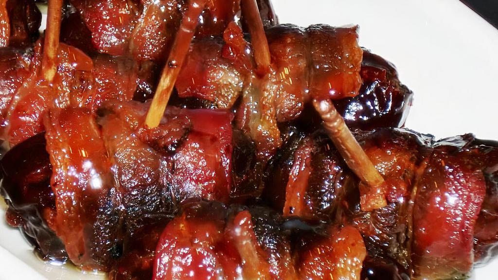 Bacon-Wrapped Dates · Serves 2. Delicious Sweet Medjool Dates wrapped in thick-cut Applewood Smoked Bacon, with your choice of stuffing: Almond or Goat Cheese.
