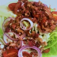 Lettuce Wedge Salad · Iceberg wedge with chopped Applewood Smoked Bacon, Red Onions, Tomatoes, and your choice of ...
