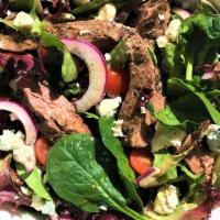Steak And Gorgonzola Salad · Thinly sliced Grilled Steak over Organic Mixed Greens, Red Onions, Grape Tomatoes, Gorgonzol...