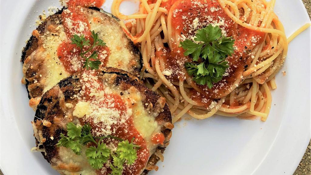 Eggplant Parmesan With Spaghetti Marinara · Thick cut Eggplant seasoned and breaded, then browned and topped with Mozzarella Cheese and baked. Comes with Spaghetti Marinara prepared with our traditional homemade recipe, made like the Italians make it!